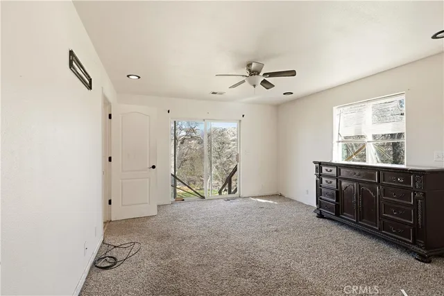 a view of workspace with furniture and window