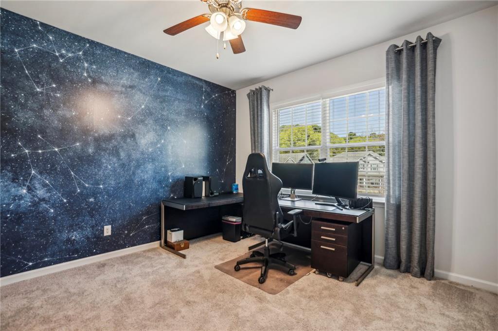 4257 Freight Street Tucker, GA 30084 - Photo 33 of 41 a view of a workspace with furniture and a window