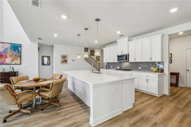 a room with furniture a book shelf and a book shelf