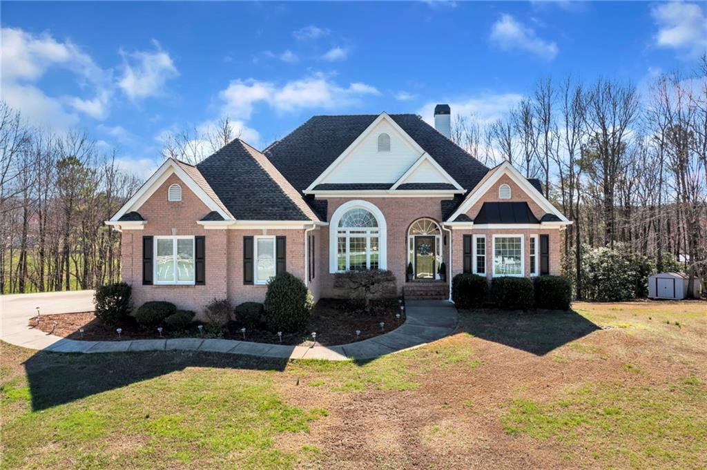 2749 Jerusalem Church Road Jasper, GA 30143 - Photo 1 of 1 a front view of a house with a yard