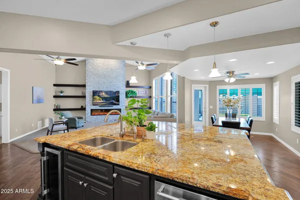 a bathroom with a double vanity sink and mirror