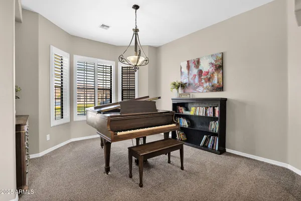 a view of workspace with a window and cabinet