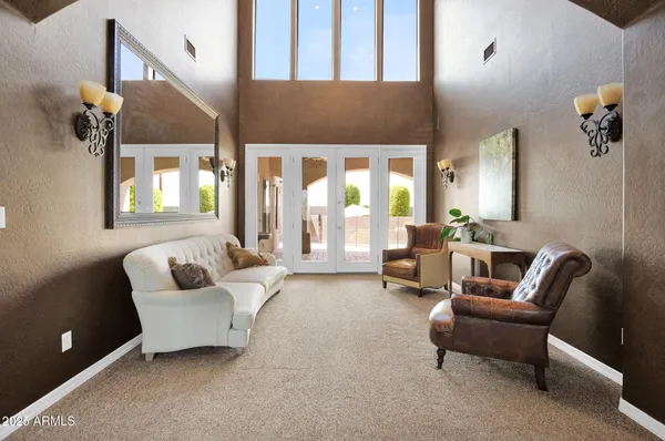a view of a dining room with furniture window and outside view