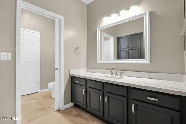a bathroom with a window and shower