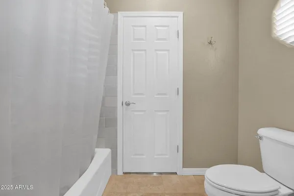 a bathroom with a sink vanity and mirror