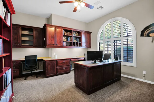 a bathroom with a double vanity sink mirror and