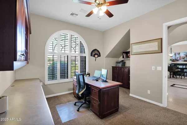 a bathroom with a shower and toilet