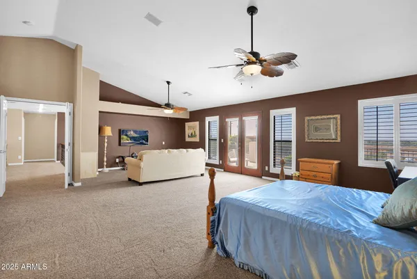 a view of an empty room with glass door