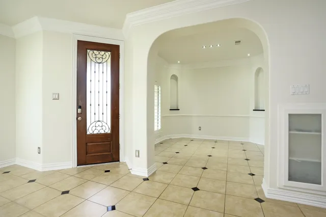 a view of a hallway with entryway