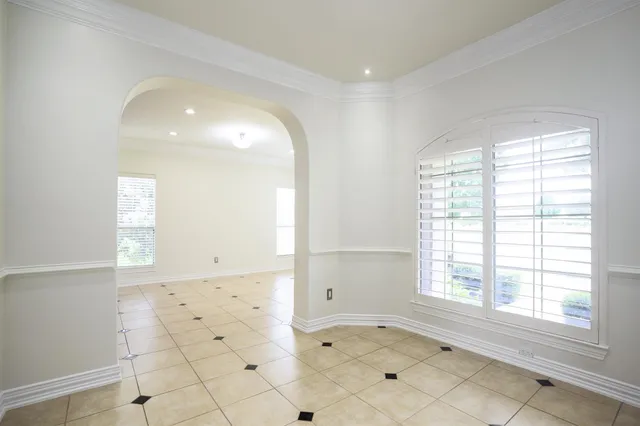 a view of an empty room and window