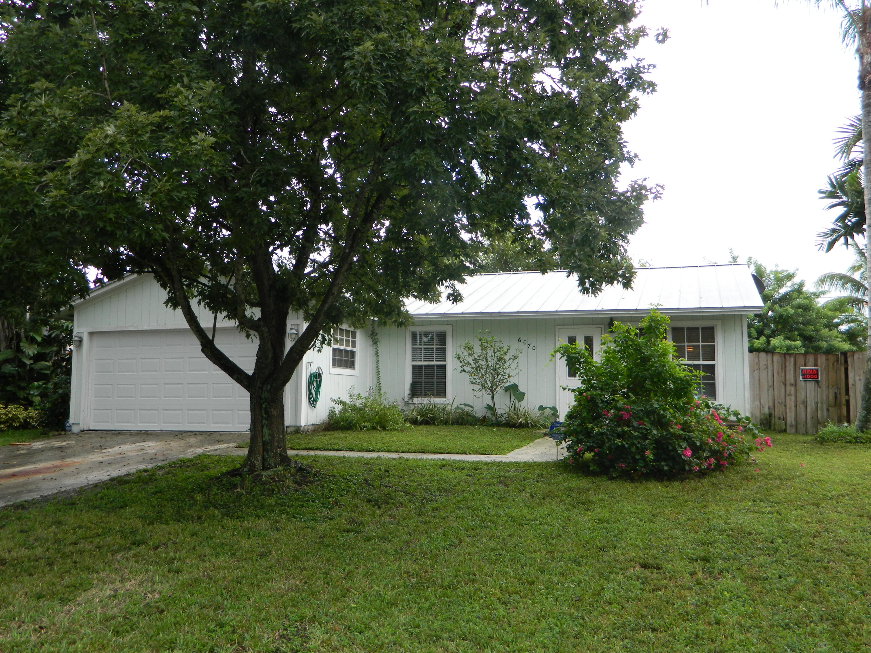 6070 Wolfe Street Jupiter, FL 33458 - Photo 1 of 11 Front