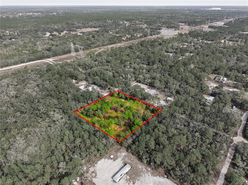 0 Southwest 151st Place Dunnellon, FL 34432 - Photo 13 of 18 an aerial view of a houses with a yard