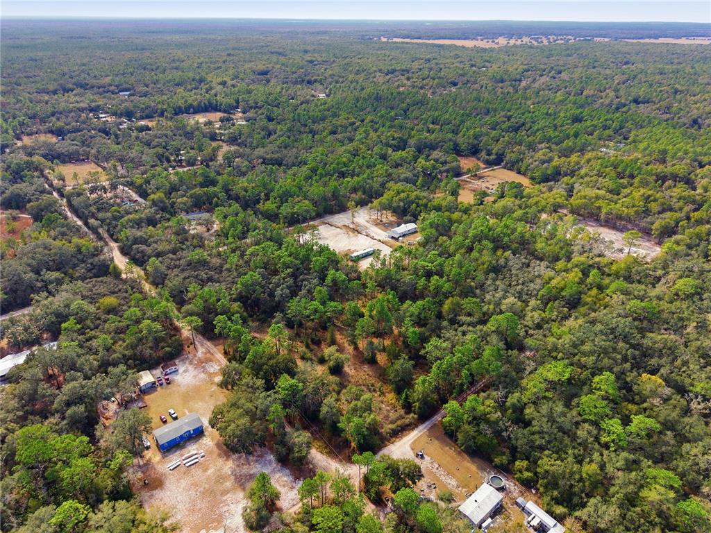 0 Southwest 151st Place Dunnellon, FL 34432 - Photo 8 of 18 an aerial view of a house with a yard