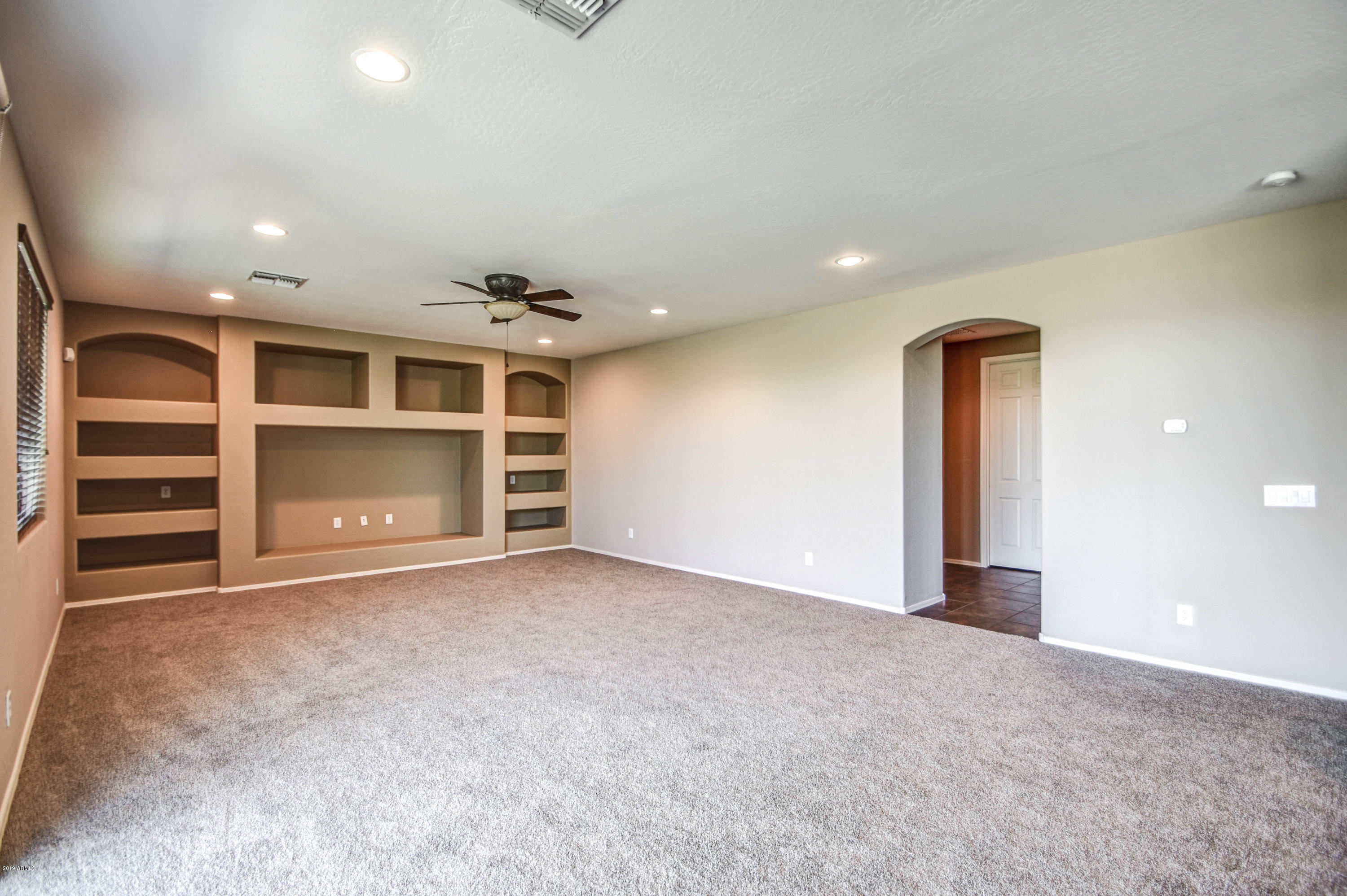 18280 Verdin Road Goodyear, AZ 85338 - Photo 17 of 44 Family Room Built-Ins
