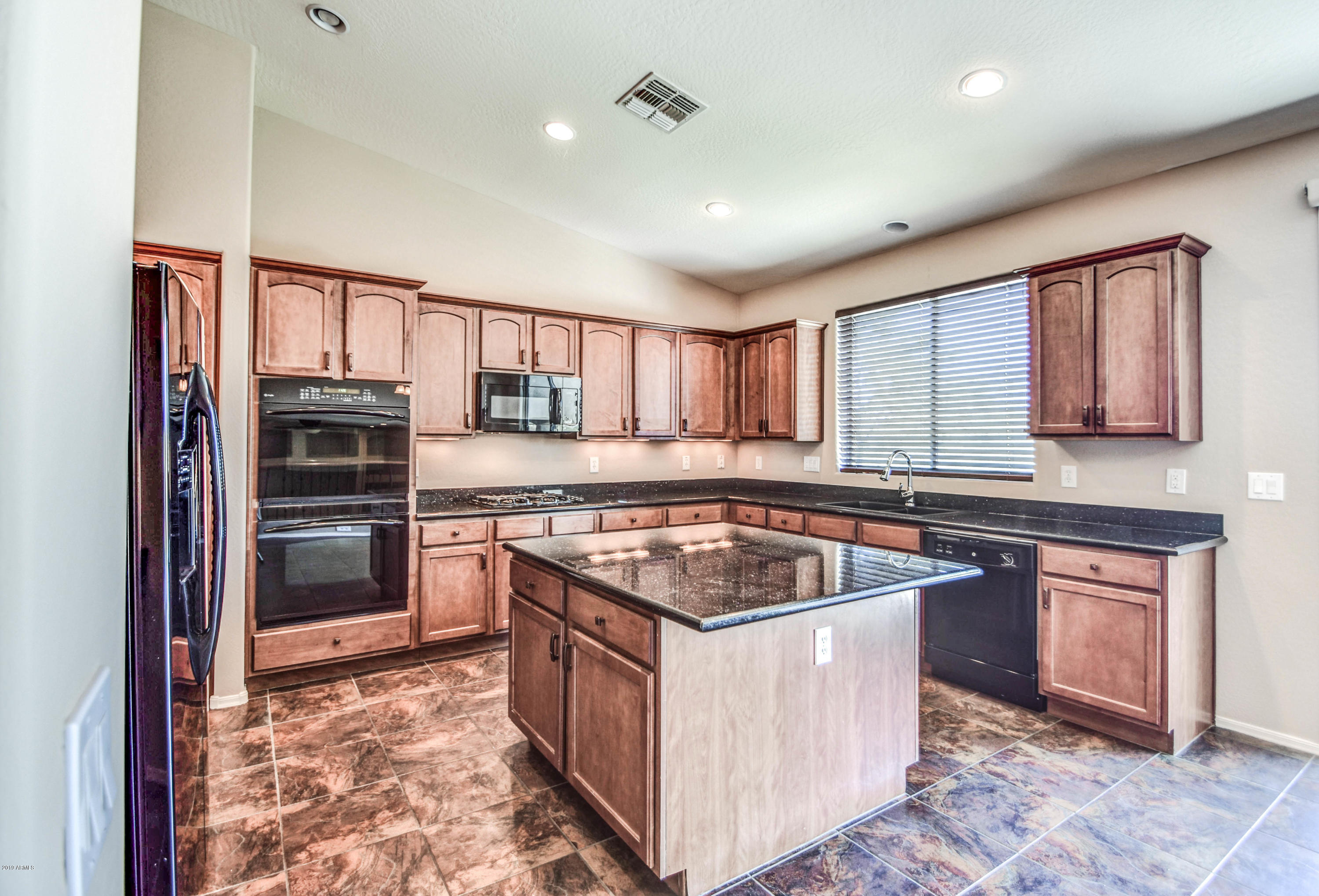18280 Verdin Road Goodyear, AZ 85338 - Photo 10 of 44 Kitchen Island