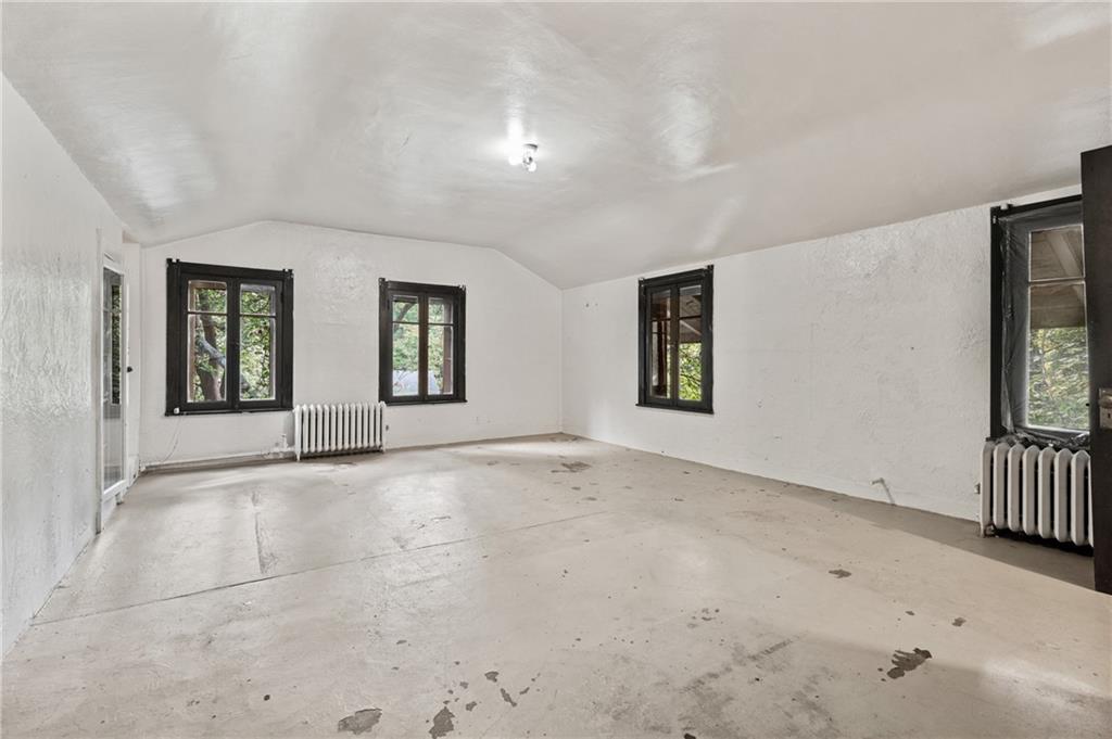717 Center Pittsburgh, PA 15215 - Photo 13 of 20 an empty room with windows