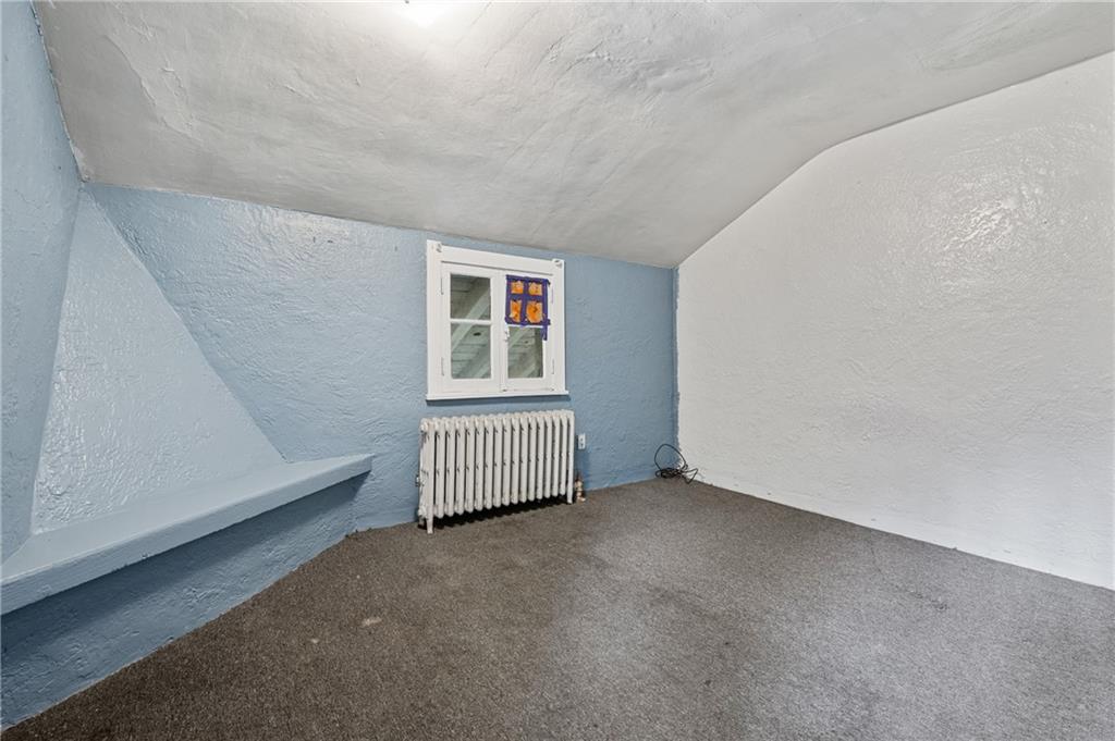 717 Center Pittsburgh, PA 15215 - Photo 14 of 20 an empty room with windows