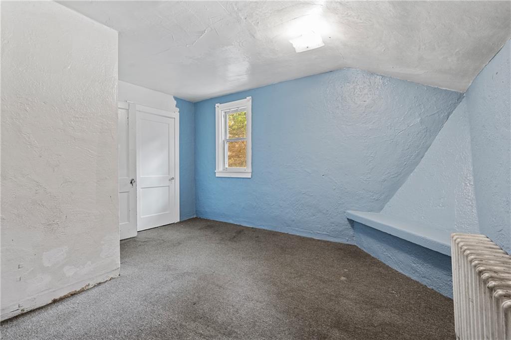 717 Center Pittsburgh, PA 15215 - Photo 15 of 20 an empty room with windows