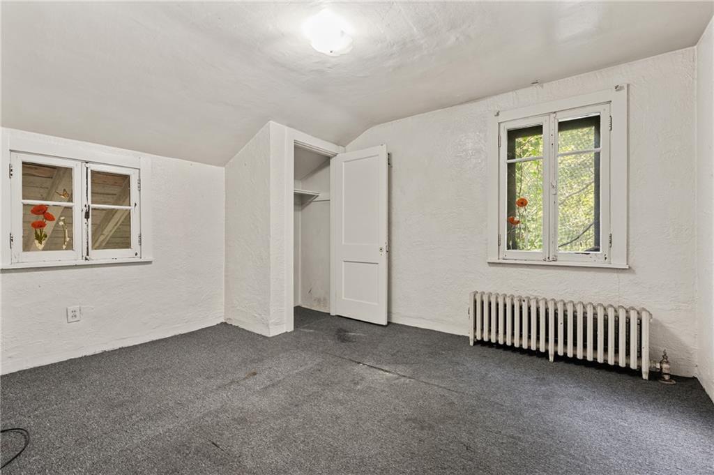 717 Center Pittsburgh, PA 15215 - Photo 17 of 20 an empty room with windows