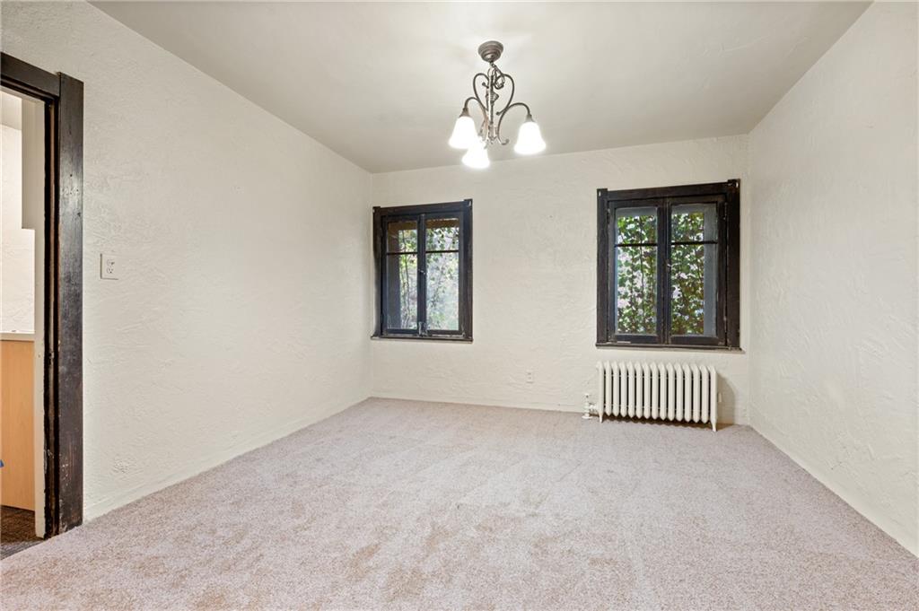 717 Center Pittsburgh, PA 15215 - Photo 5 of 20 an empty room with windows