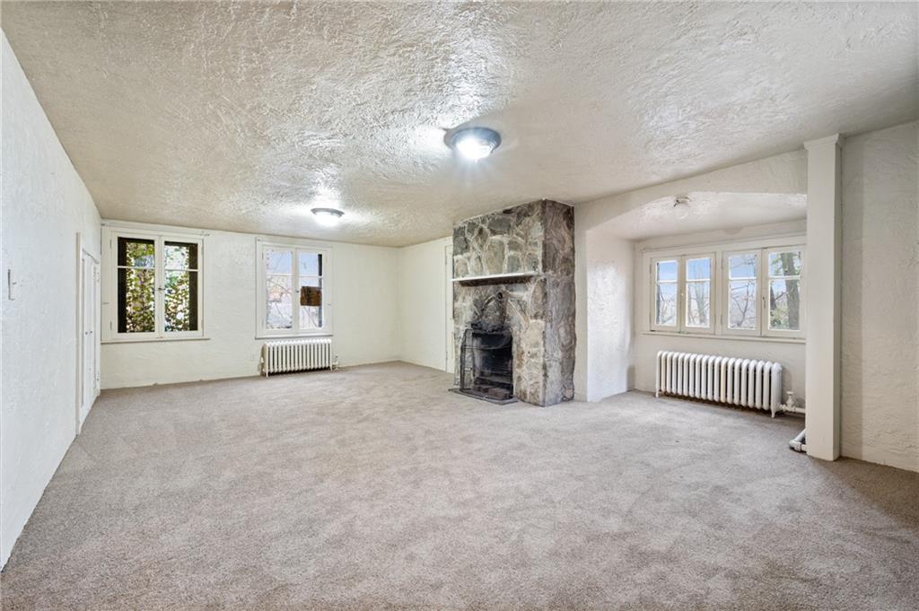 717 Center Pittsburgh, PA 15215 - Photo 6 of 20 an empty room with windows and closet