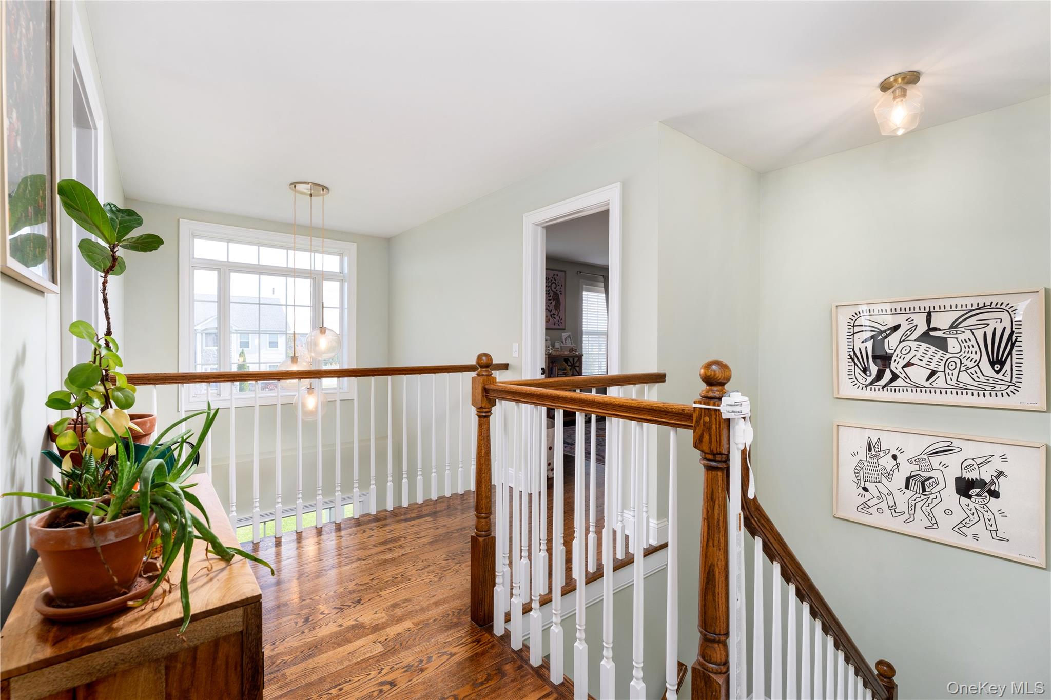 108 Calverton Court Wading River, NY 11792 - Photo 15 of 36 a view of entryway with wooden floor