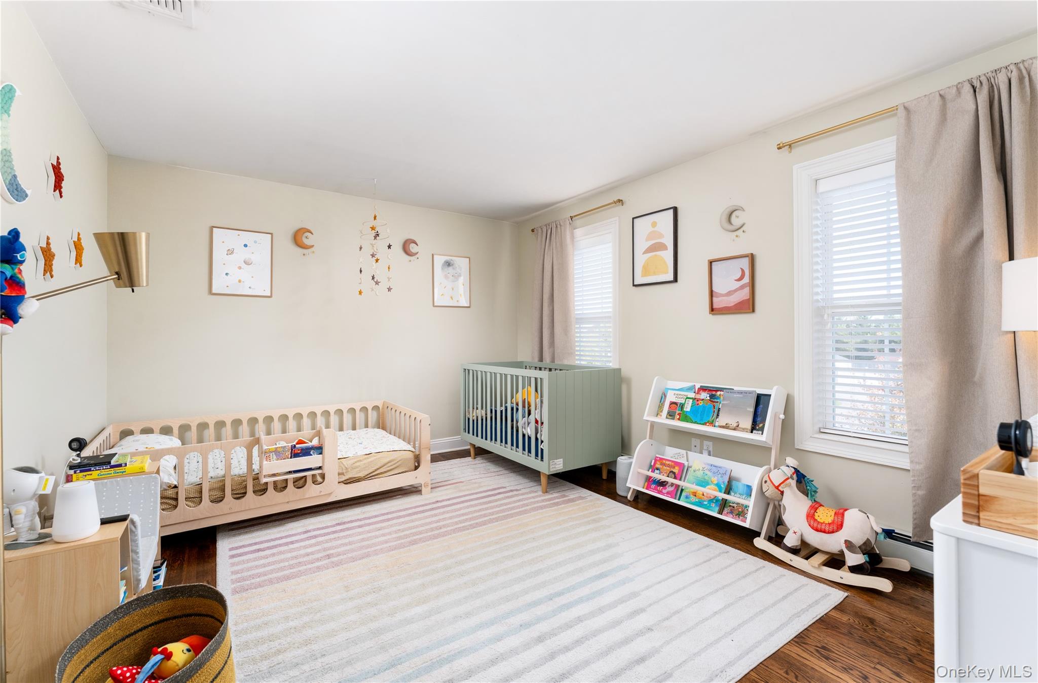108 Calverton Court Wading River, NY 11792 - Photo 17 of 36 a bedroom with furniture and a window
