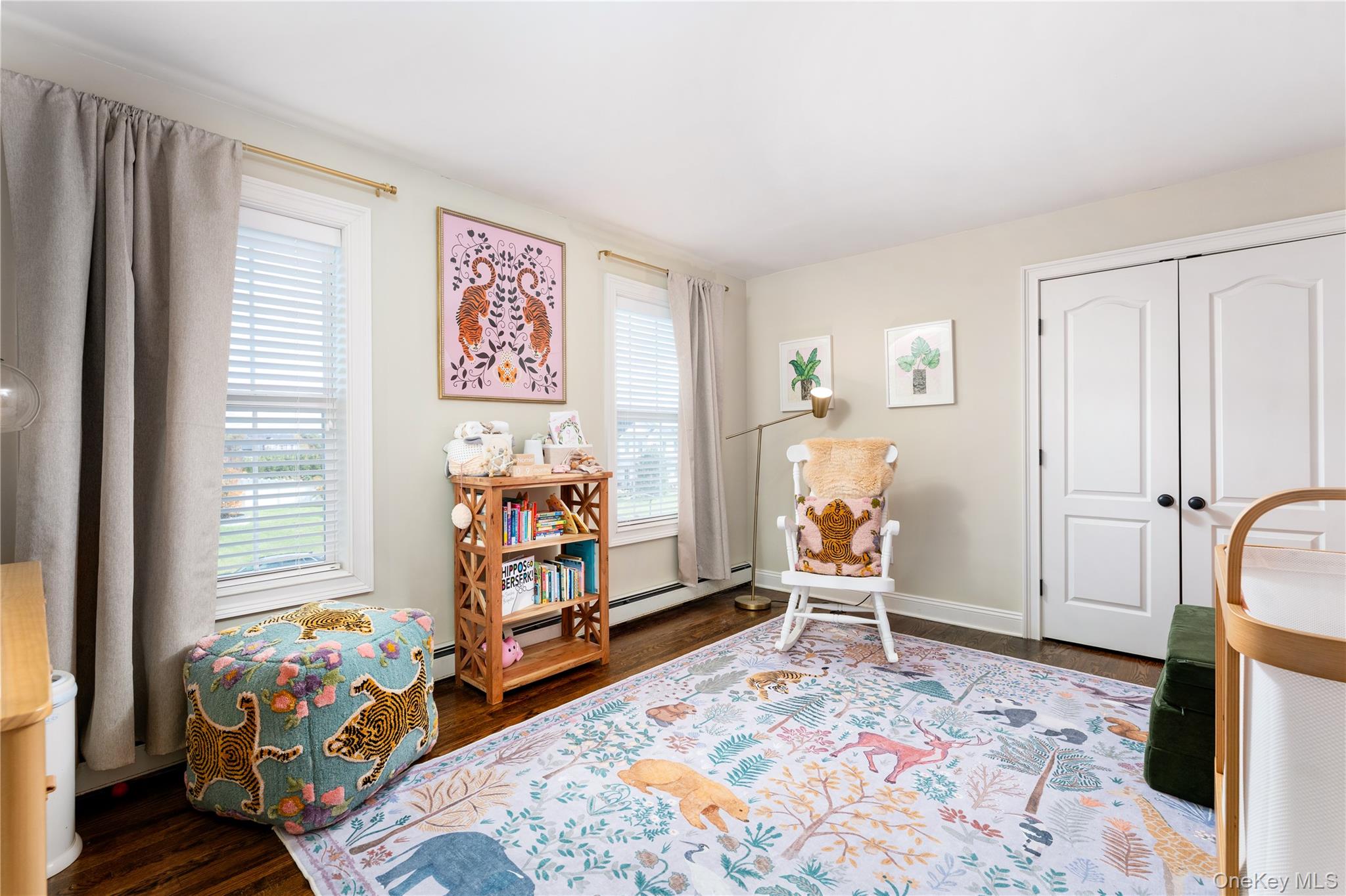 108 Calverton Court Wading River, NY 11792 - Photo 18 of 36 a bedroom with furniture and a window