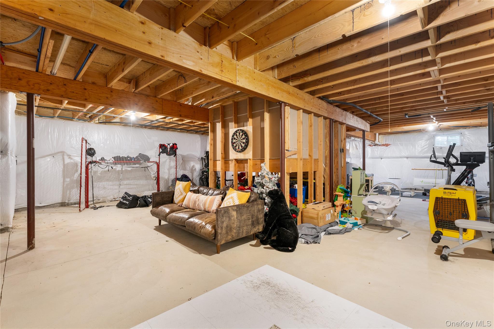 108 Calverton Court Wading River, NY 11792 - Photo 26 of 36 a view of a room with gym equipment