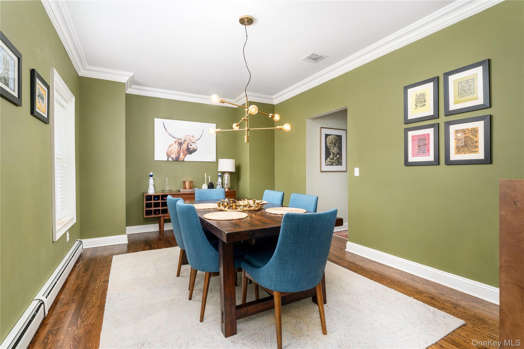 108 Calverton Court Wading River, NY 11792 - Photo 3 of 36 a dining room with furniture and window