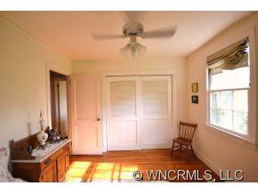 231 Woodland Road Tryon, NC 28782 - Photo 24 of 24 a living room with furniture and a window
