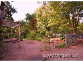 231 Woodland Road Tryon, NC 28782 - Photo 4 of 24 a view of a park with welcome board