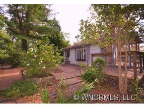 231 Woodland Road Tryon, NC 28782 - Photo 7 of 24 a view of a backyard