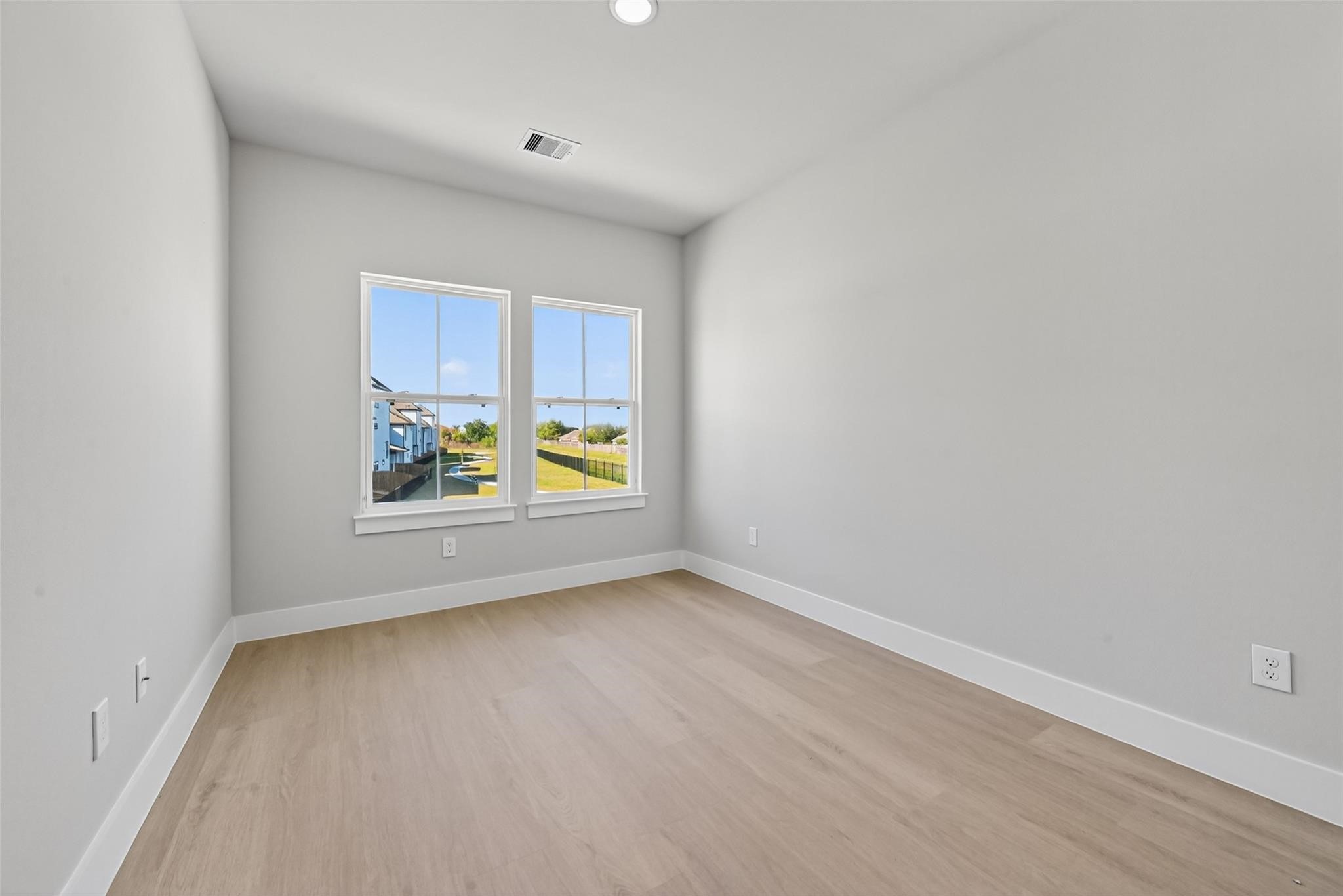 6702 Metro Boulevard, Unit 8 Houston, TX 77083 - Photo 19 of 36 a view of an empty room with a window