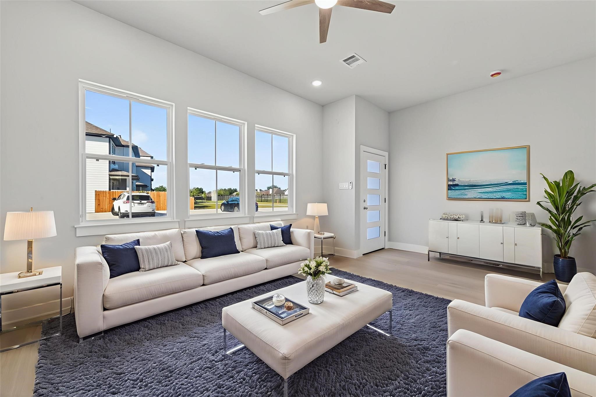 6702 Metro Boulevard, Unit 8 Houston, TX 77083 - Photo 4 of 36 a living room with furniture and a large window
