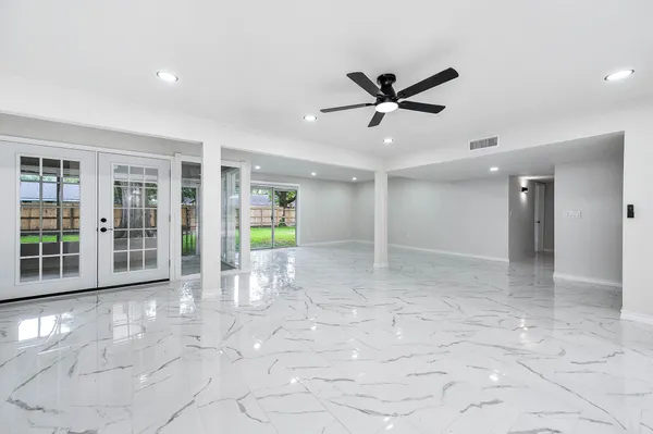 a kitchen with stainless steel appliances granite countertop a sink stove microwave and cabinets
