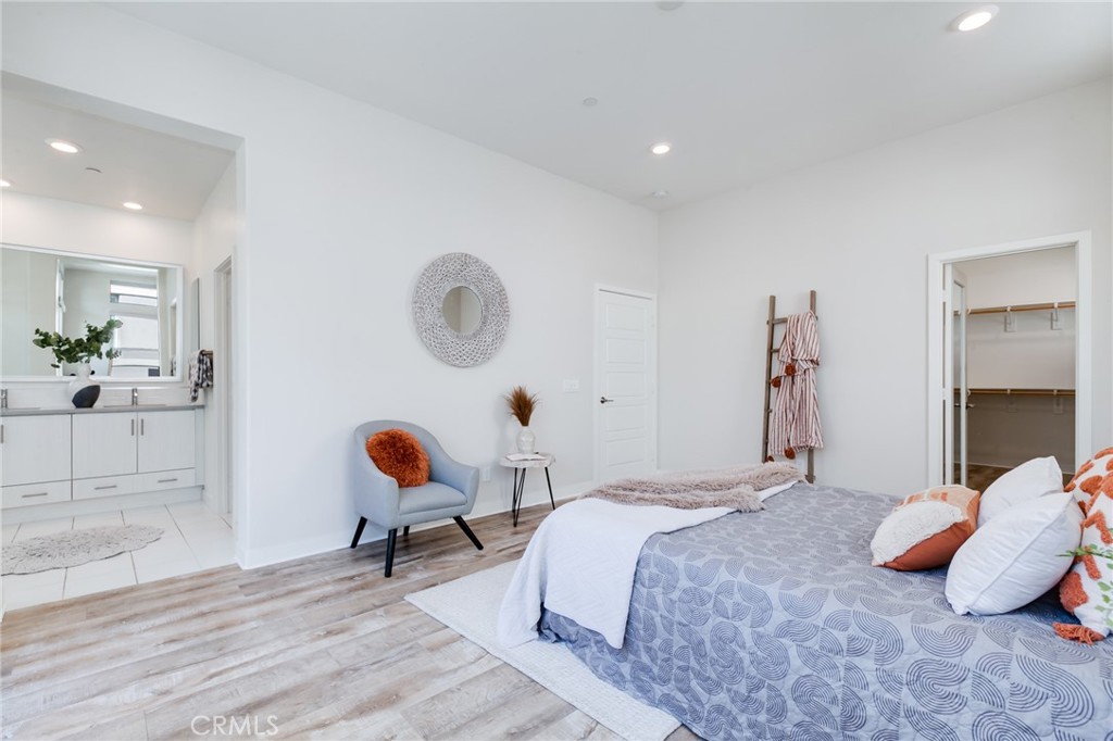 800 Beacon Irvine, CA 92618 - Photo 24 of 49 a bedroom with a bed and window