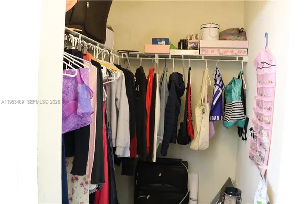 a view of a livingroom with furniture and stairs