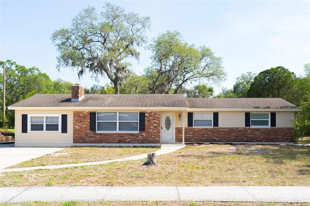 a house view with a swimming pool