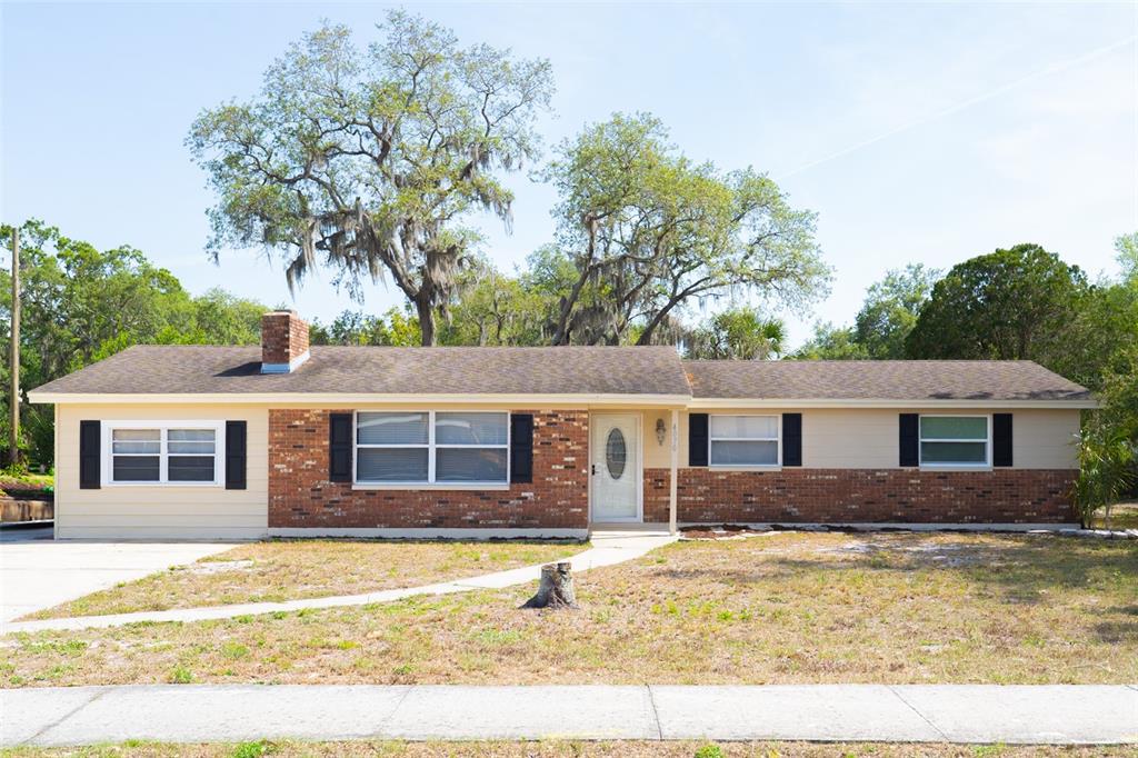 a house view with a swimming pool