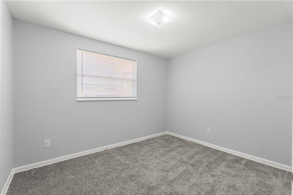 4070 McNeil Road Apopka, FL 32703 - Photo 11 of 28 an empty room with a window