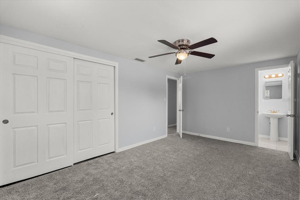 4070 McNeil Road Apopka, FL 32703 - Photo 14 of 28 a view of a livingroom with a ceiling fan