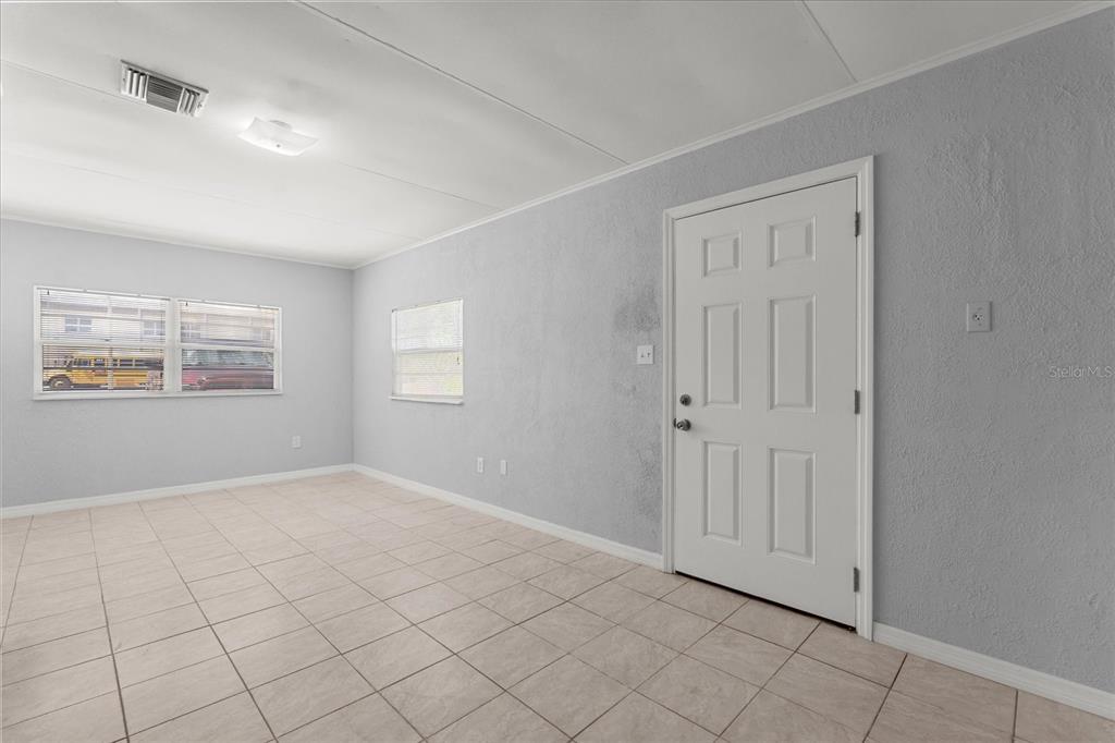 4070 McNeil Road Apopka, FL 32703 - Photo 17 of 28 a view of an empty room with window
