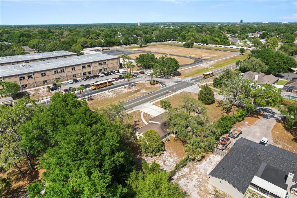 4070 McNeil Road Apopka, FL 32703 - Photo 27 of 28 a view of a swimming pool with a yard