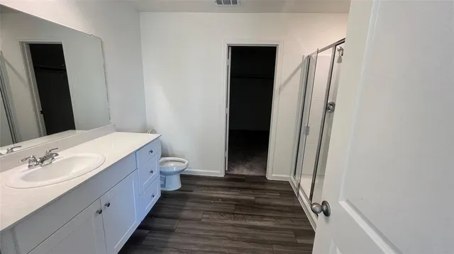 a view of a hallway with staircase