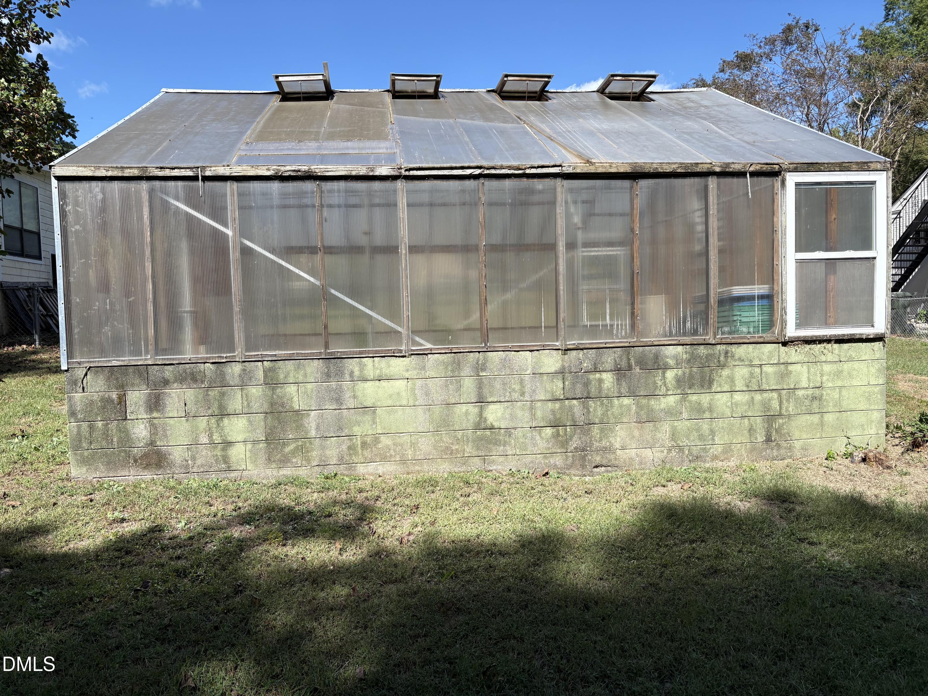 616 Brooks Avenue Raleigh, NC 27607 - Photo 3 of 3 a bathroom with a sink and mirror