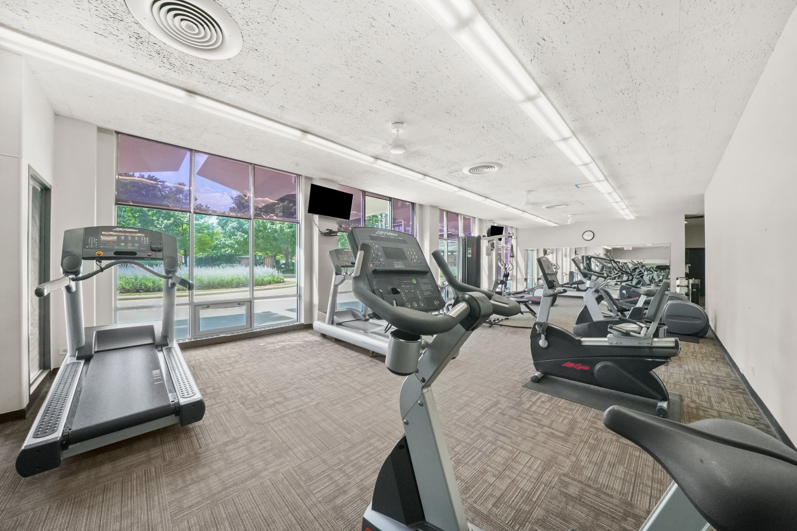 1455 North Sandburg Terrace, Unit 801 Chicago, IL 60610 - Photo 20 of 23 a view of a room with gym equipment