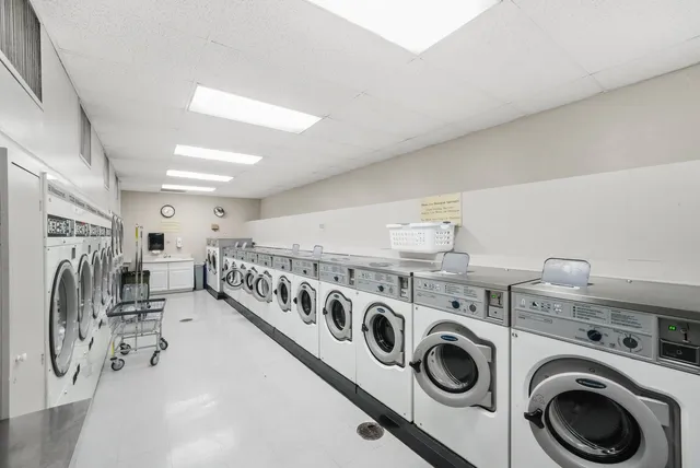 a view of a street with a building in the background