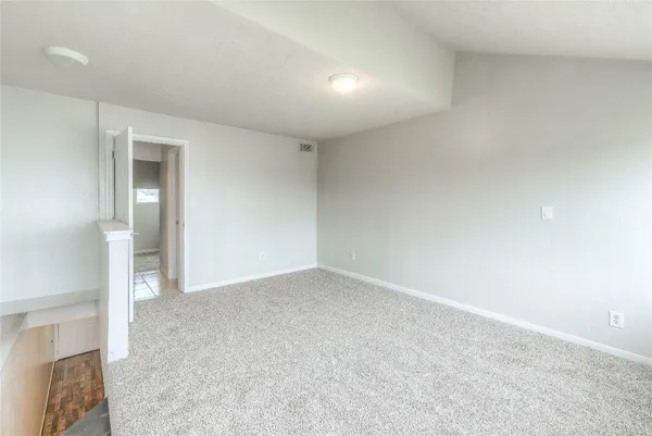 an empty room with an entryway