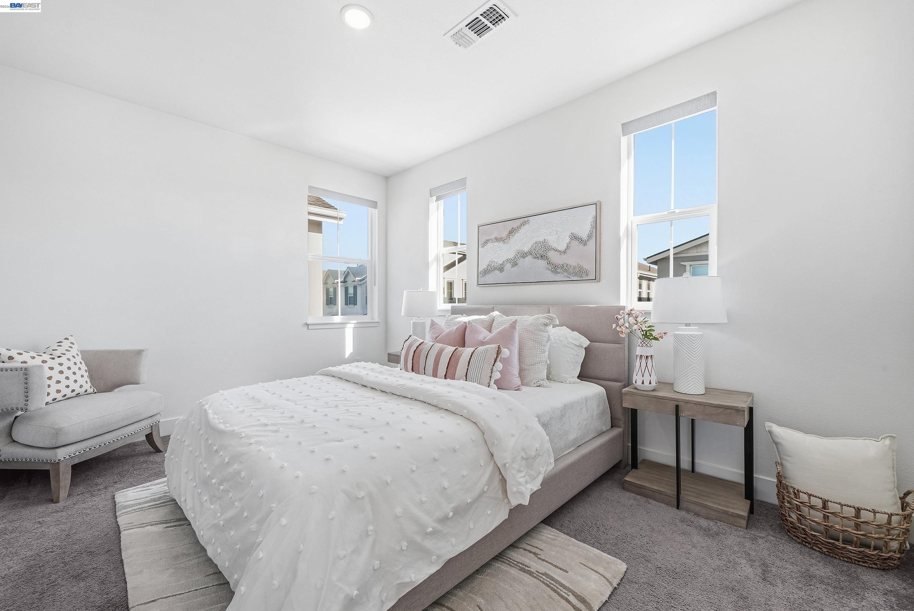 37645 Bay Crest Road Newark, CA 94560 - Photo 20 of 46 a bedroom with a bed and a couch